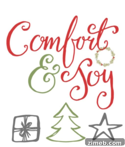 Free Holiday Comfort Joy Printables 3 Styled 'Comfort & Joy' printable sign as part of a Christmas display
