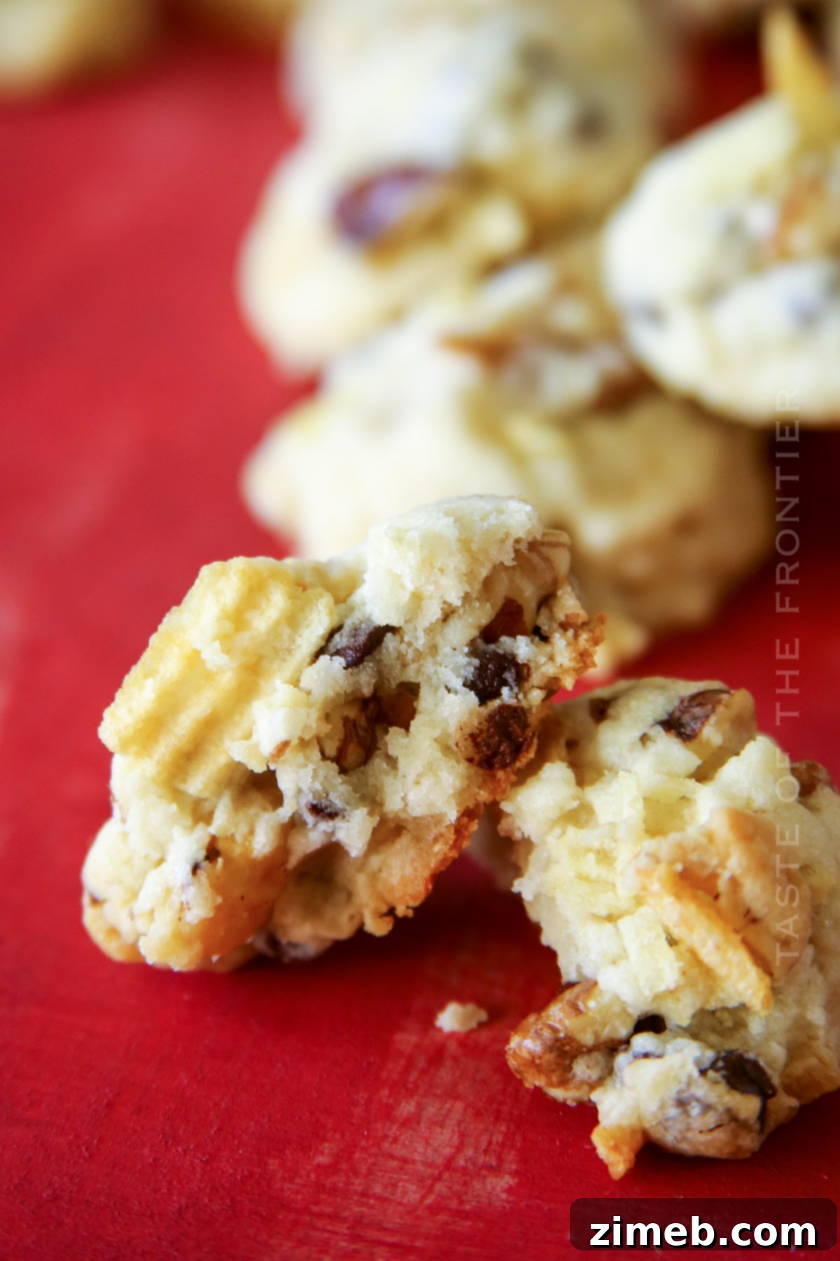 Salty-Sweet Walnut Chip Bliss 8 Hand holding a delicious salty sweet cookie with visible inclusions