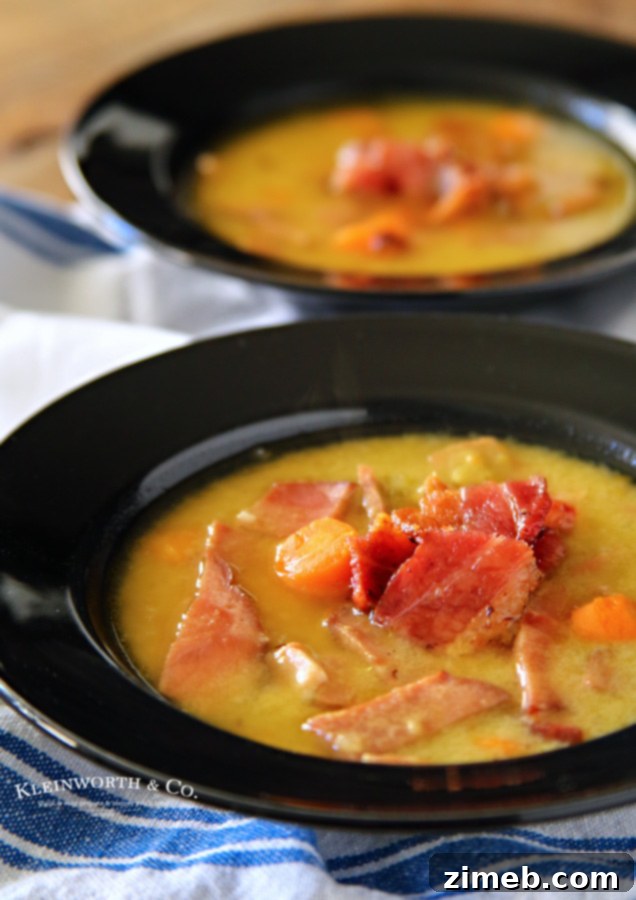 Smoky Bacon & Split Pea Crock-Pot Comfort 3 A bowl of Slow Cooker Bacon Split Pea Soup garnished with fresh parsley.