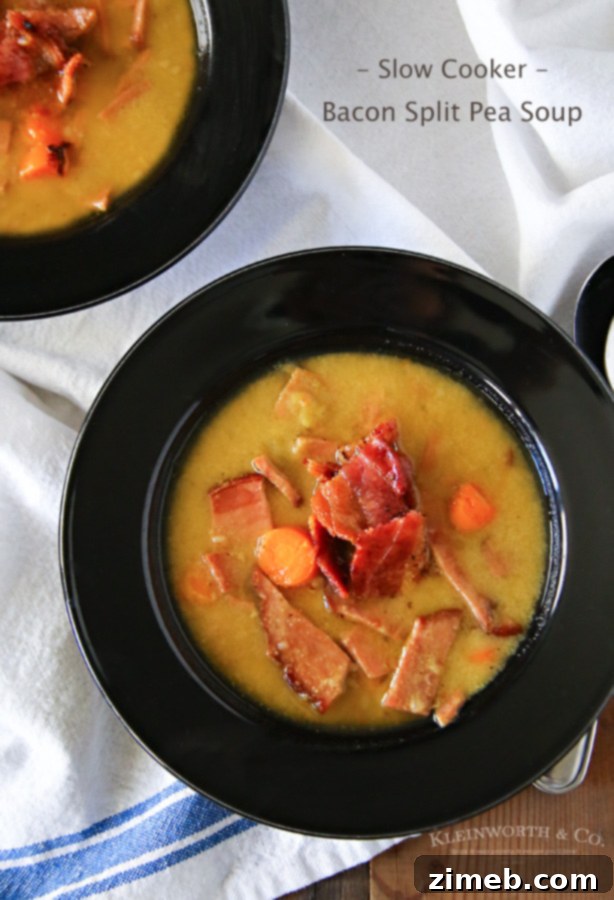 Smoky Bacon & Split Pea Crock-Pot Comfort 8 Slow Cooker Bacon Split Pea Soup in a bowl with a spoon, ready to eat.