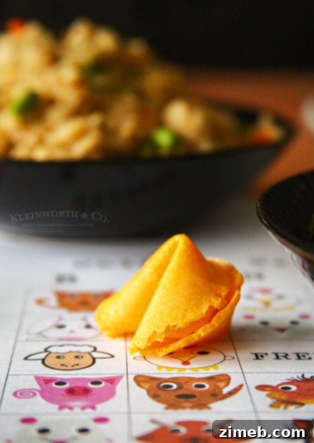 Play Chinese New Year Bingo and Win 500 Dollars 4 P.F. Chang's Home Menu Chicken Fried Rice in a skillet, ready to serve