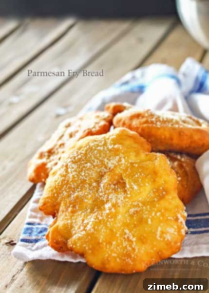 Signature BBQ Meatball Fry Bread Tacos 6 Parmesan Fry Bread - a savory twist on classic fry bread, perfect as a side or base for various toppings.