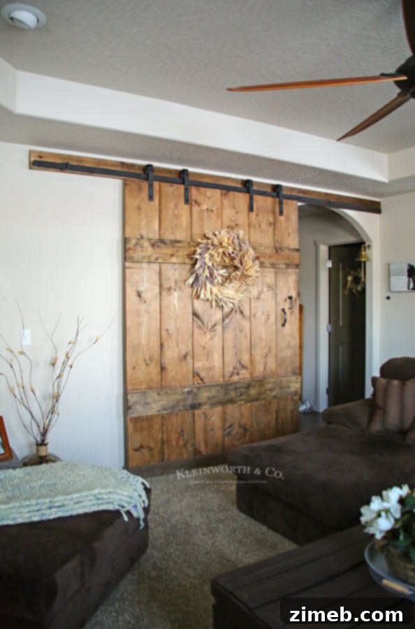 Decorated Wide Rustic Barn Door with Wreath