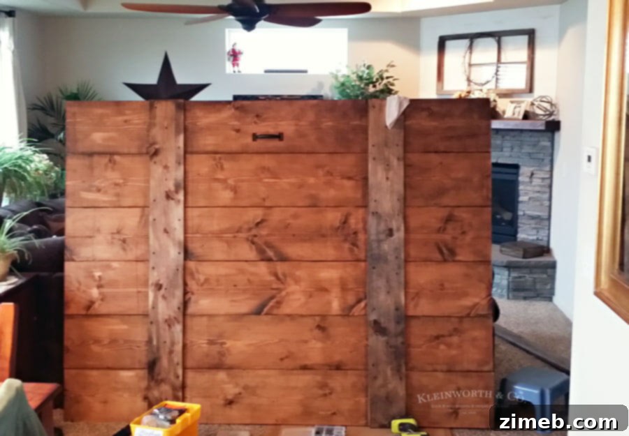 Staining the Wide Rustic Barn Door with Jacobean Wood Stain