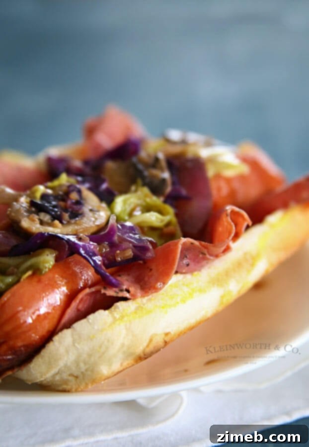 Pastrami Relish Hotdog 3 Pastrami and Relish Dog with fresh ingredients on a wooden board