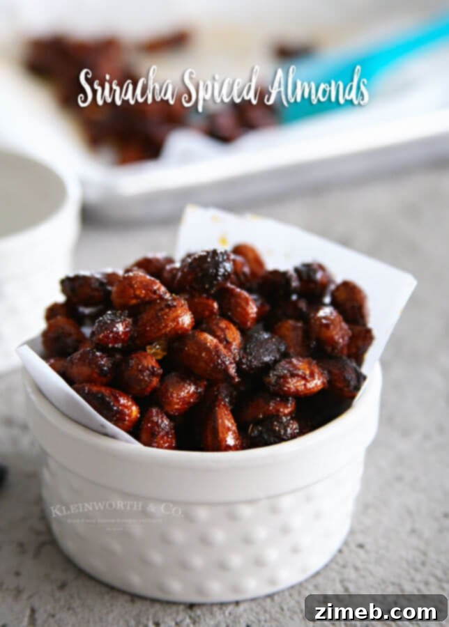 A close-up of Sriracha Spice Almonds arranged artfully, inviting viewers to try the recipe.