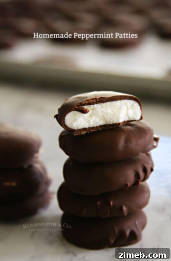 Homemade Peppermint Patties - close up on one coated patty