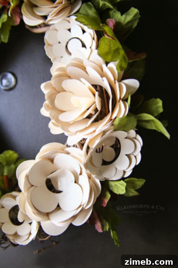 Craft a Beautiful Paper Flower Wreath with Cricut 12 Completed paper flower wreath with initial and leaves