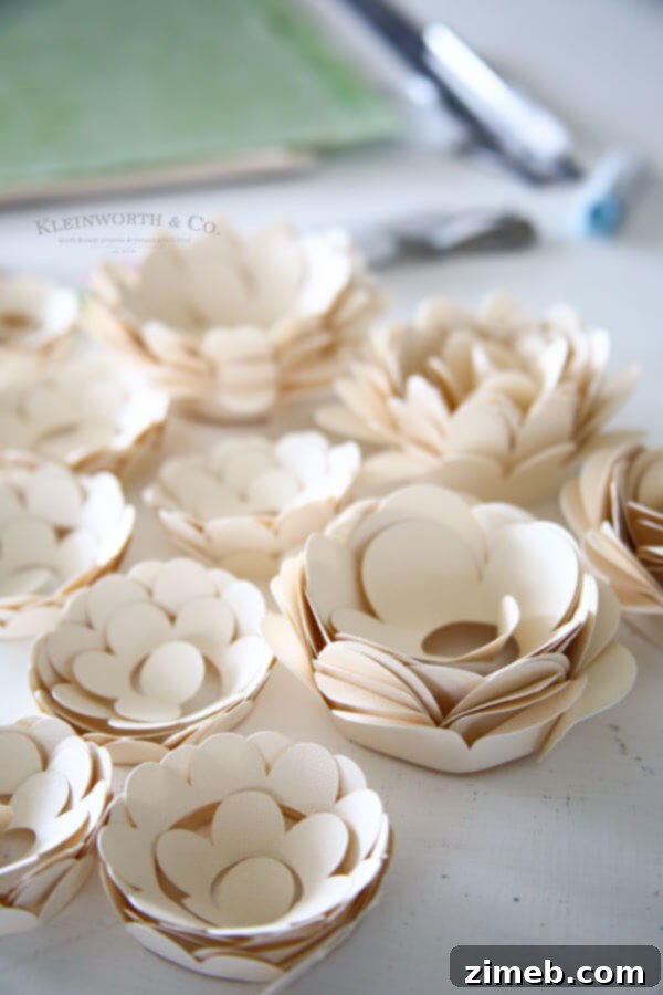 Craft a Beautiful Paper Flower Wreath with Cricut 9 Collection of paper flowers ready for rolling
