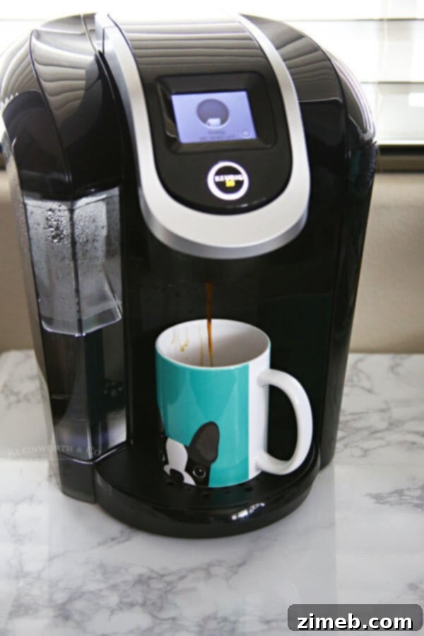 Coffee Lover's Dream Basket 9 Inserting Coffee K-Cup into Brewer