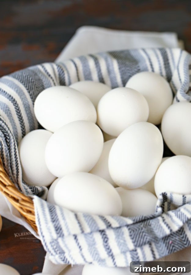 Foolproof Hard Boiled Eggs 5 Cooked eggs in an ice bath, ready for peeling