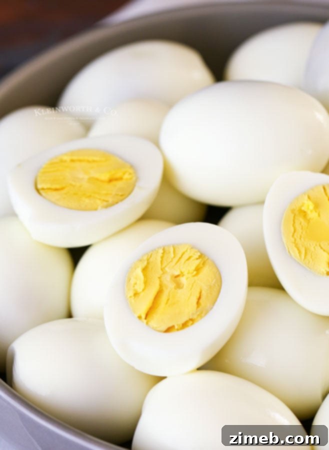 Foolproof Hard Boiled Eggs 7 Perfectly peeled hard boiled eggs showing a firm yolk