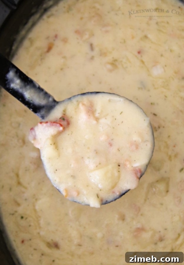 A beautifully presented Disney-inspired Clam Chowder Bread Bowl, inviting to eat.