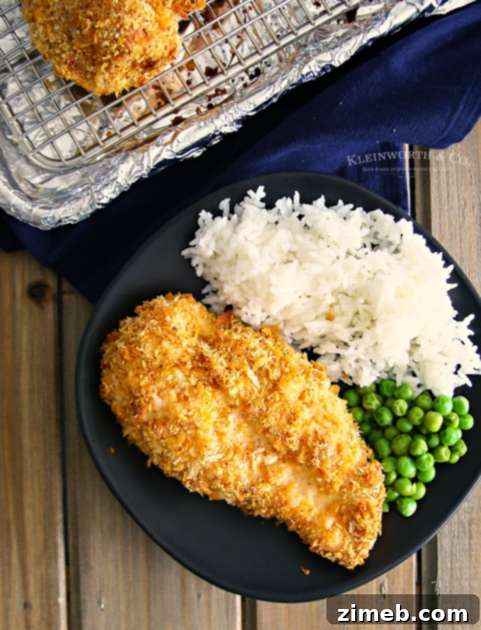Golden Crispy Sriracha Cheesy Chicken Bake 2 Close-up of Crispy Sriracha Cheesy Chicken Bake, showing the golden crust and juicy interior.