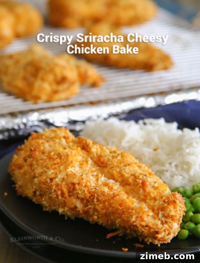 Golden Crispy Sriracha Cheesy Chicken Bake 5 Another enticing shot of Crispy Sriracha Cheesy Chicken Bake on a serving platter, garnished and ready to eat.