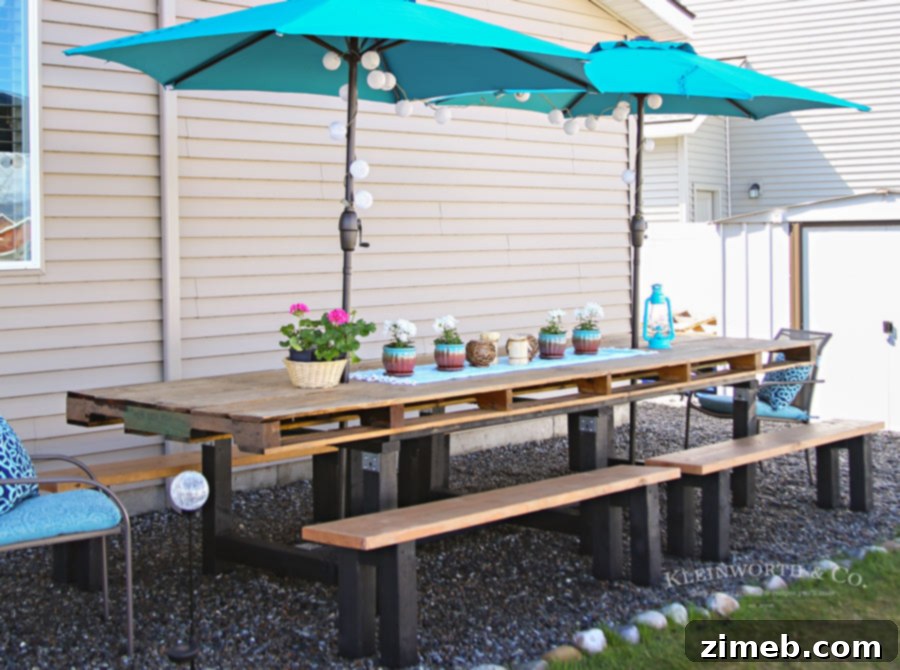 Family enjoying the newly decorated Spring Outdoor Pallet Table Decor setup.