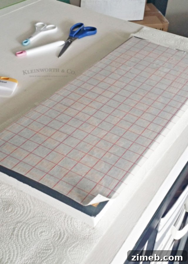Positioning Your Custom Cricut Vinyl Stencil onto a Wood Sign
