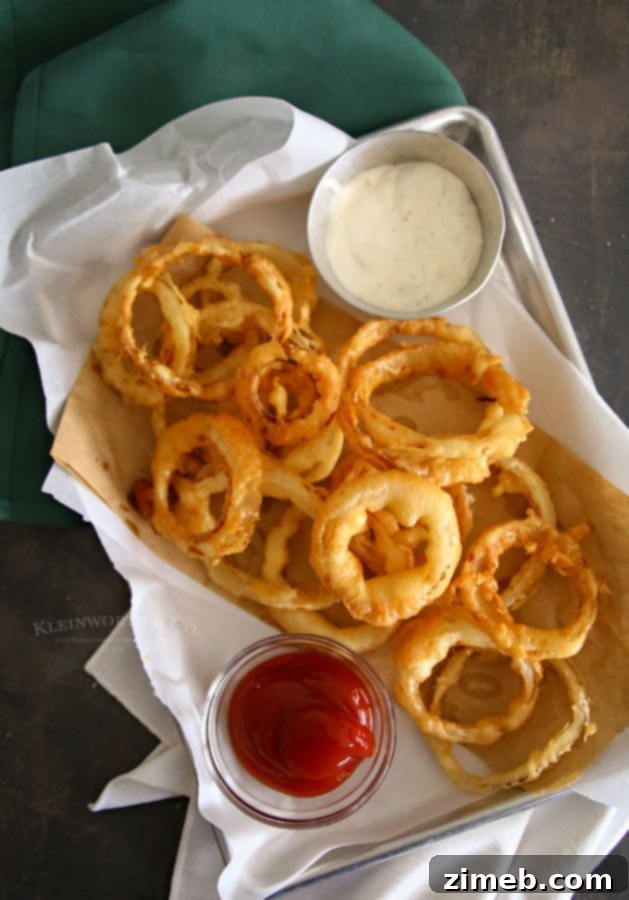Crispy Golden Beer-Battered Onion Rings 2 Close-up of freshly battered onion rings ready for frying