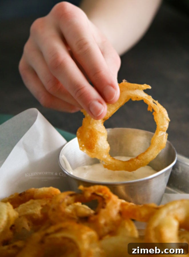 Crispy Golden Beer-Battered Onion Rings 4 Serving of Beer Battered Onion Rings ready to eat