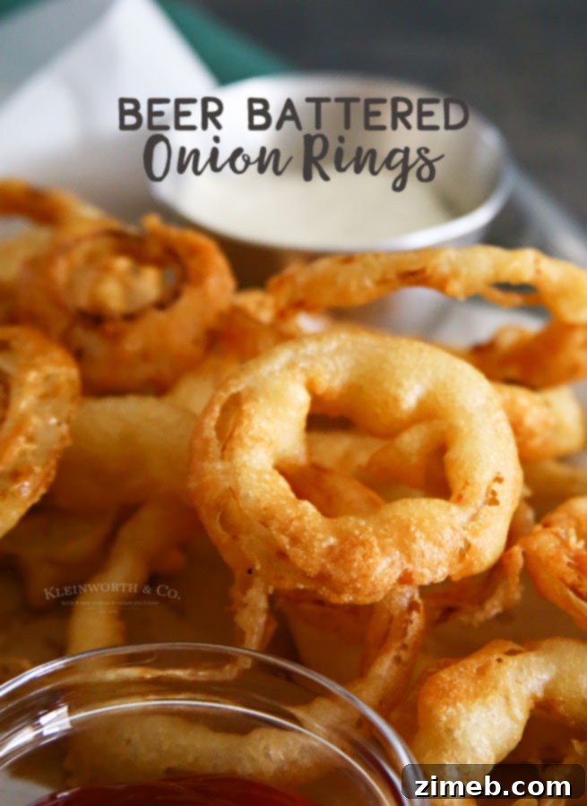 Crispy Golden Beer-Battered Onion Rings 6 The absolute best Beer Battered Onion Rings served on a plate