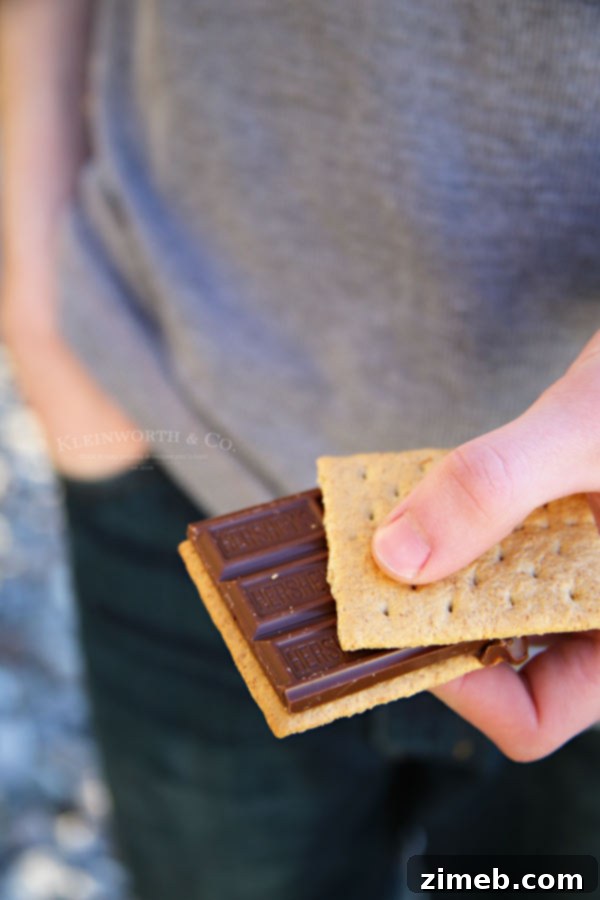 Free Printable S'mores Party Invites 5 Close-up of HERSHEY’S Milk Chocolate bars, showcasing their irresistible texture for S'mores.