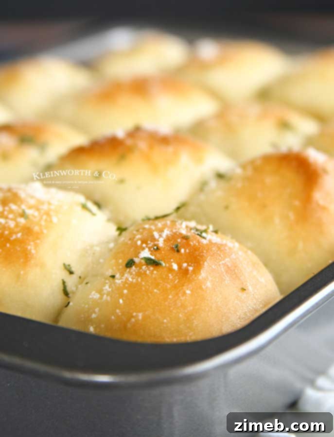 Garlic Parmesan Dinner Rolls in 30 Minutes 14 30-Minute Garlic Parmesan Dinner Rolls ready for holiday serving.