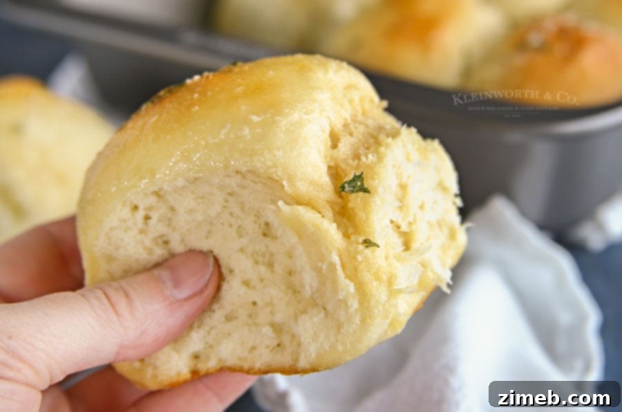 Garlic Parmesan Dinner Rolls in 30 Minutes 3 A digital thermometer showing the ideal water temperature for yeast activation, crucial for successful dinner rolls.