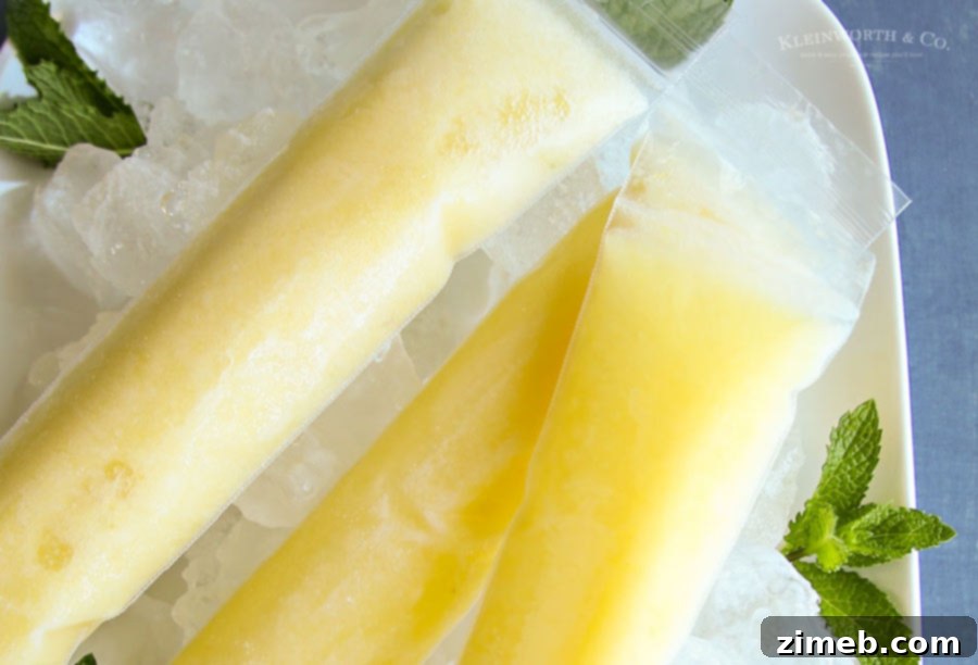 Decadent Pineapple Whip Pops 3 Dirty Pineapple Whip Pops - Homemade Boozy Dole Whip