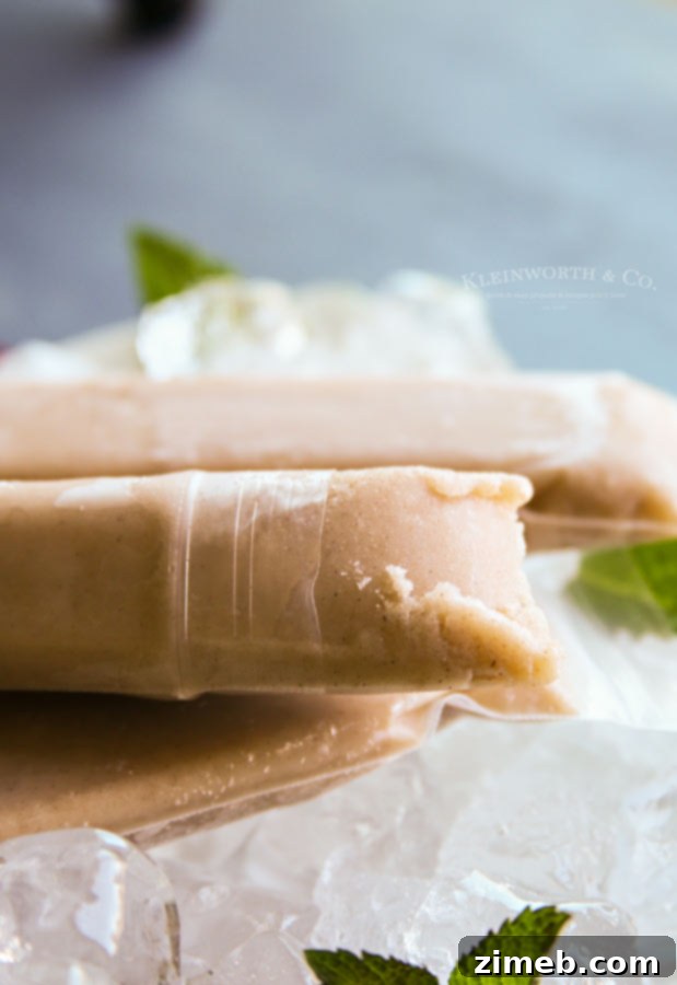 A collection of Naughty Banana Cinnamon Rum Pops, vibrant and inviting, displayed in their convenient pouches.