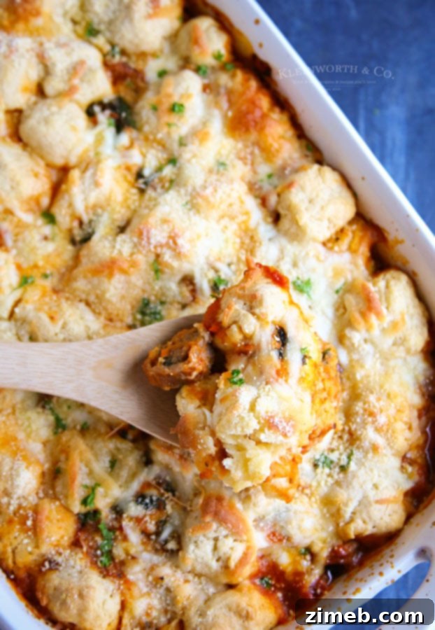 Chicken Spinach & Sausage Bubble Up in a baking dish