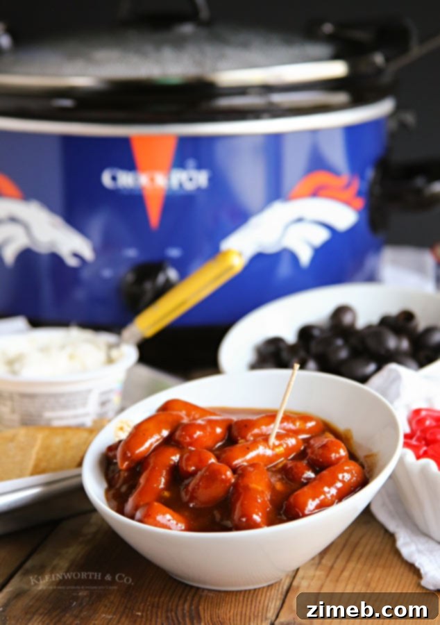 Delicious Easy Slow Cooker Garlic BBQ Smokies simmering for game day