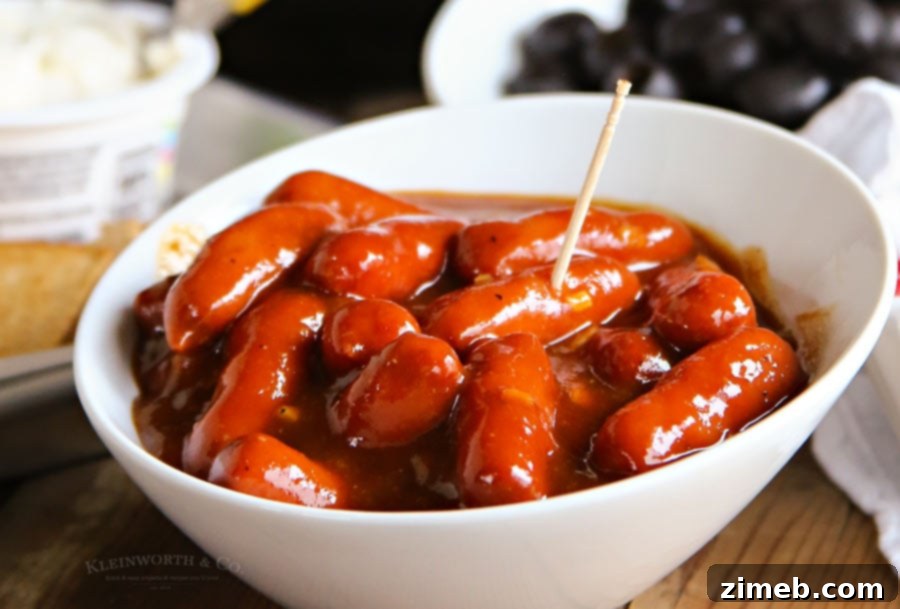Easy Slow Cooker Garlic BBQ Smokies in a serving dish
