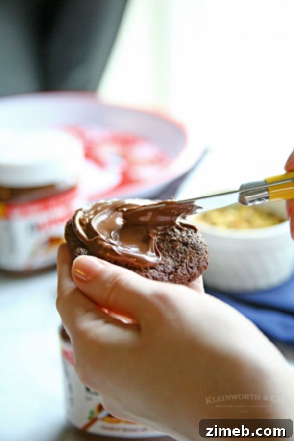 Close-up of chocolate Nutella pistachio cookie recipe, showcasing the rich texture and festive toppings.