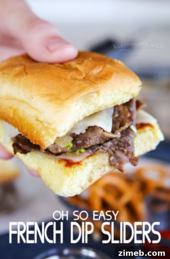 Effortless French Dip Bites 8 Easy French Dip Sliders ready to serve with au jus for dipping