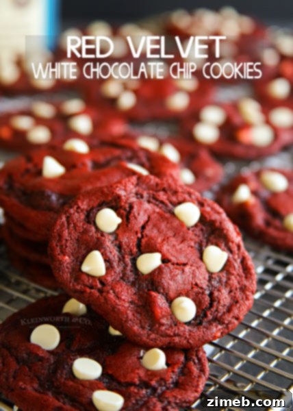 Gourmet Giant Chocolate Chip Cookies 6 Stack of Red Velvet White Chocolate Chip Cookies with a dusting of powdered sugar.