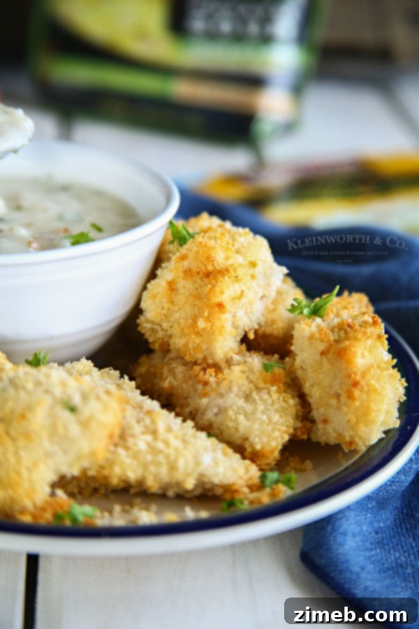 Golden Crispy Chicken Tenders with Hearty Potato Soup 2 Golden brown Air Fryer Chicken Strips, perfectly crispy and ready for dipping.