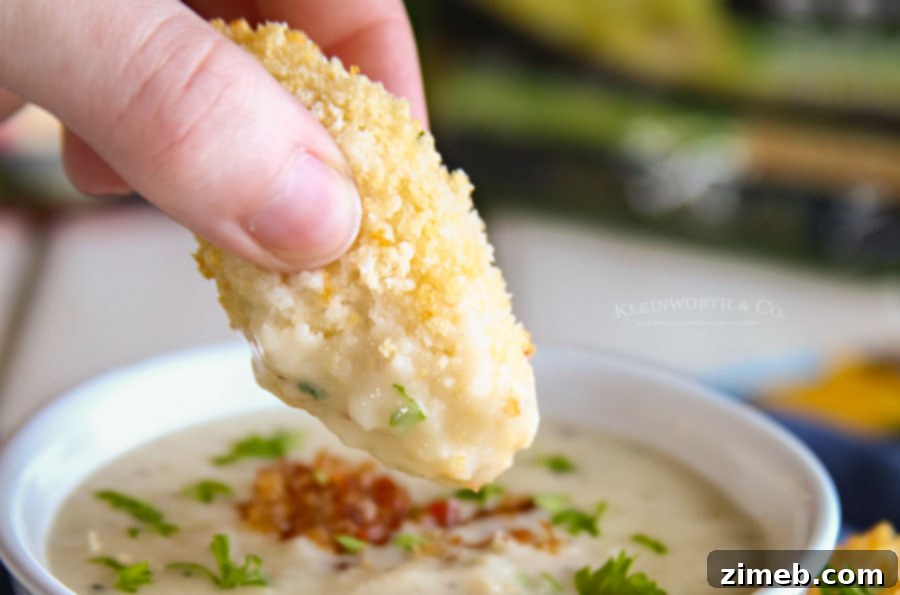 Golden Crispy Chicken Tenders with Hearty Potato Soup 6 Delicious homemade chicken tenders, showcasing their inviting golden crust.