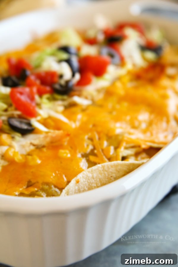 Creamy Southwest Chicken Casserole 3 Hearty Southwest Casserole with melted cheese and fresh toppings in a baking dish