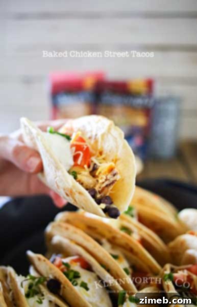 Baked Chicken Street Tacos are an easy family dinner idea. Quick to make using rotisserie chicken smothered in homemade crema & baked in the iron skillet. Seriously SO GOOD we made them twice in one weekend!