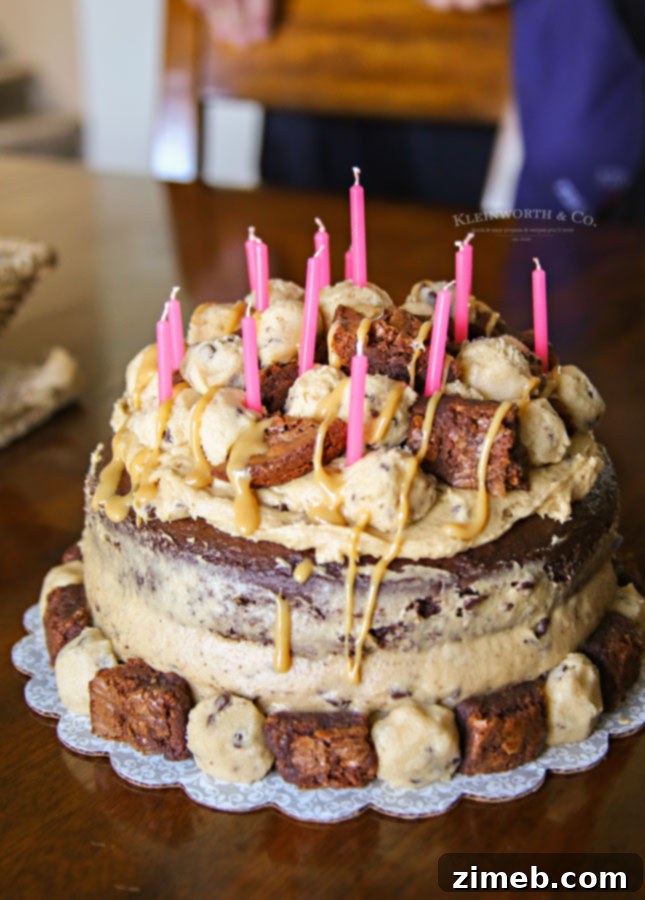 The Ultimate Brownie & Cookie Dough Freak Cake 6 A beautifully frosted brownie cookie dough cake, highlighting the frosting