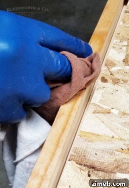 Build a Wheeled Garden Box 11 Staining the Wooden Planter Box for Protection
