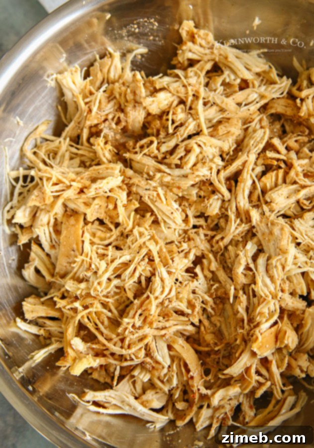 Slow cooker pulled chicken with rich fiesta flavors