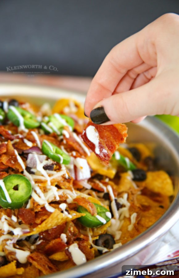 Ultimate Smoked BBQ Bacon Nachos 4 Delicious pulled pork, a key ingredient for BBQ bacon nachos.