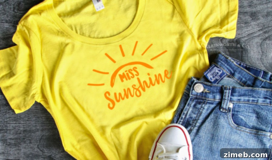 Miss Sunshine Tee Transfer 3 Miss Sunshine T-Shirt Iron-On design being applied with a heat press