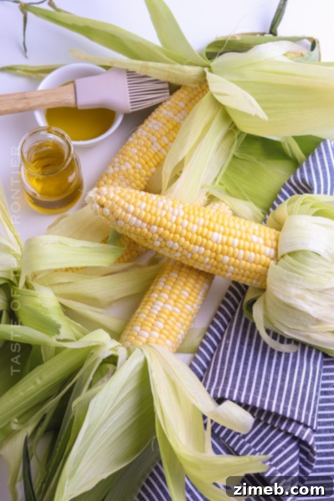 Ember-Kissed Corn 4 How to make Smoked Fiesta Corn on the Cob with husks tied