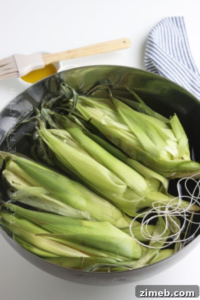 Ember-Kissed Corn 5 Soaking corn on the cob in water before smoking
