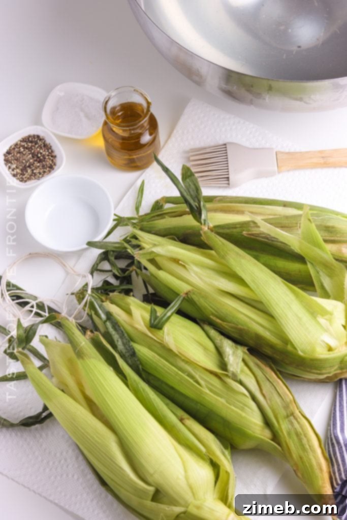 Ember-Kissed Corn 6 Soaked corn on the cob ready for seasoning and smoking
