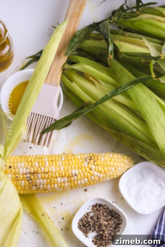 Ember-Kissed Corn 7 Seasoning corn for the smoker with butter, cheese, and chili powder