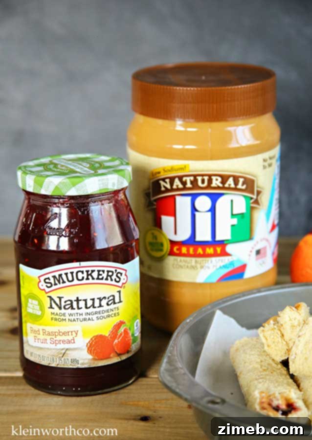 Peanut Butter and Jelly Pinwheels 4 Assembling Peanut Butter & Jelly Roll-Ups with Jif and Smucker's products