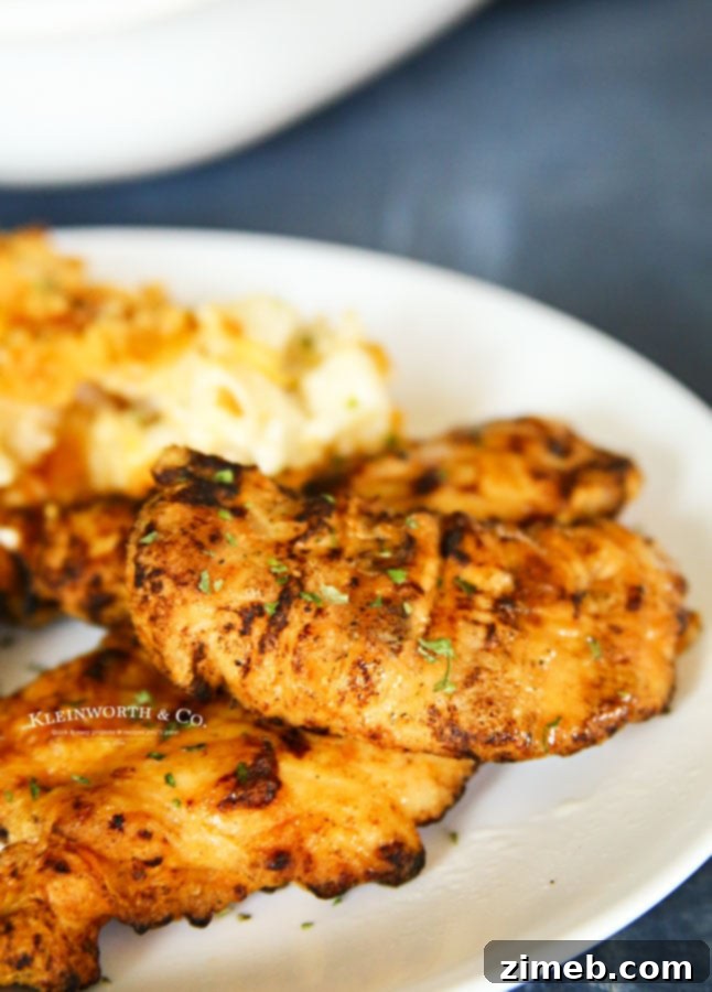 Cheesy Potato Casserole and Flame-Grilled Chicken 3 Cooked Perfect Fire Grilled Chicken Dinner with Cheesy Potato Casserole